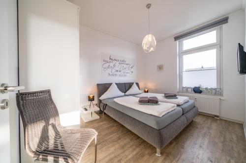 Borkum Ferienwohnung Amelie - Schlafzimmer 1