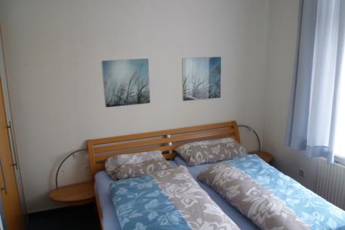 Borkum Ferienwohnung Möwennest III Wohnung 11 - Schlafzimmer