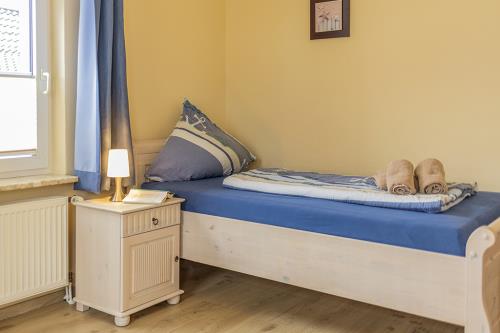 Borkum Ferienwohnung Swantje / Haus Leuchtturmkieker - Schlafzimmer 2